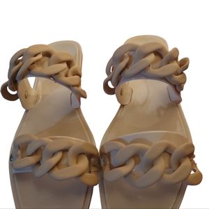 Steve Madden slide sandals.